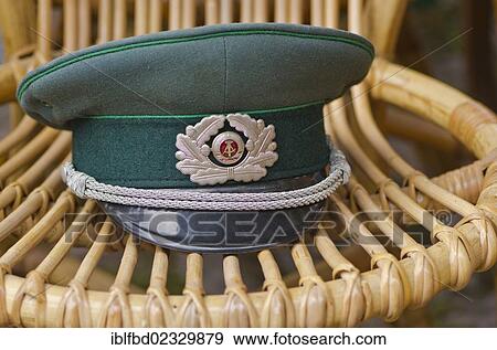 "Officers hat from former GDR military for sale at the weekly flea market, Dresden, Saxony, Germany, Europe" View Large Photo Image Stock Photo - "Officers hat from former GDR military for sale at the weekly flea market, Dresden, Saxony, Germany, Europe". Fotosearch