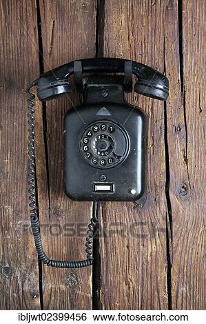 "Old Bakelite wall telephone from 1950, hanging on a rustic wooden wall" View Large Photo Image Stock Photograph - "Old Bakelite wall telephone from 1950, hanging on a rustic wooden wall". Fotosearch
