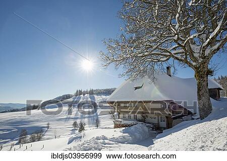 Stock Photo - "Old Black Forest house and snow-covered landscape, Muggenbrunn, Todtnau, Black Forest, Baden-Wuerttemberg, Germany, Europe". Fotosearch