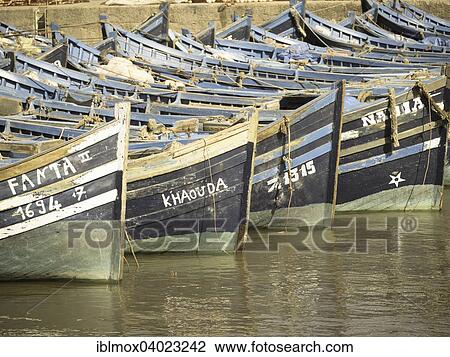 "Old blue fishing boats in the port of Essaouira, Unesco World Heritage Site, Morocco, Africa" View Large Photo Image Stock Image - "Old blue fishing boats in the port of Essaouira, Unesco World Heritage Site, Morocco, Africa". Fotosearch