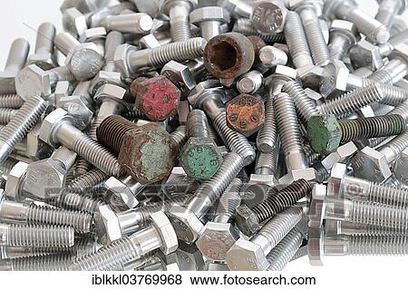 Old bolts on a pile of new bolts View Large Photo Image Stock Photo - Old bolts on a pile of new bolts. Fotosearch