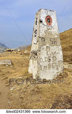 Stock Photograph - "Old border marker between Albania and Monte near Cerem, Valbona National Park, Albanian Alps, Albania, The Balkans, Europe". Fotosearch