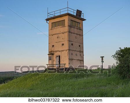 "Old border tower on hill, evening light, today lookout tower and museum, former border Thuringia and Bavaria, Hermannsfeld, Thuringia, Germany, Europe" View Large Photo Image Stock Image - "Old border tower on hill, evening light, today lookout tower and museum, former border Thuringia and Bavaria, Hermannsfeld, Thuringia, Germany, Europe". Fotosearch