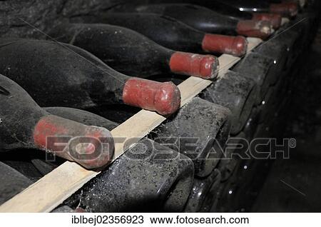 "Old bottles in a wine cellar, Burgundy, France, Europe" View Large Photo Image Stock Image - "Old bottles in a wine cellar, Burgundy, France, Europe". Fotosearch