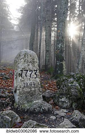 "Old boundary stone between Austria and Germany, Bavaria and Tyrol, from 1773, Allgau, Falkenstein, Swabia, Bavaria, Germany, Europe" View Large Photo Image Stock Photograph - "Old boundary stone between Austria and Germany, Bavaria and Tyrol, from 1773, Allgau, Falkenstein, Swabia, Bavaria, Germany, Europe". Fotosearch