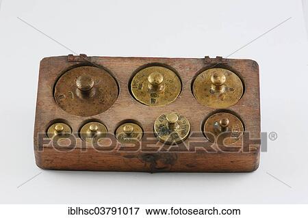 Old brass weights in a wooden box View Large Photo Image Stock Photo - Old brass weights in a wooden box. Fotosearch