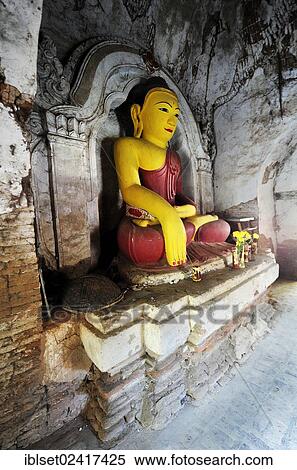 Stock Photography - Old Buddha in a temple in Amarapura, near Mandalay, Myanmar, Burma, Southeast Asia, Asia. Fotosearch