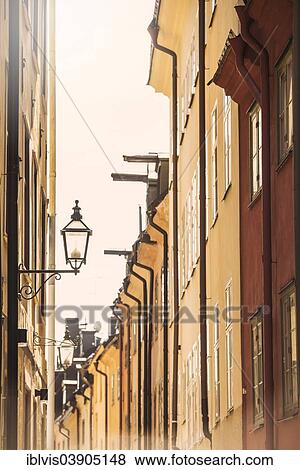 Stock Photo - "Old buildings in a narrow alley, Stockholm, Stockholm County, Sweden, Europe". Fotosearch