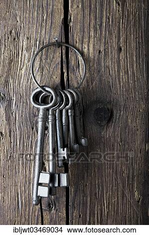 "Old bunch of keys hanging on a wooden wall, Germany, Europe" View Large Photo Image Picture - "Old bunch of keys hanging on a wooden wall, Germany, Europe". Fotosearch