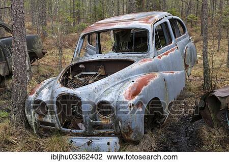 "Old car wreck in the car cemetery of Kyrkoe Mosse, Ryd, Tingsryd, Kronoberg County, Sweden, Europe" View Large Photo Image Stock Image - "Old car wreck in the car cemetery of Kyrkoe Mosse, Ryd, Tingsryd, Kronoberg County, Sweden, Europe". Fotosearch
