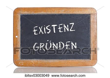 Stock Photo - "Old chalkboard, lettering """"EXISTENZ GRUENDEN"""", German for """"SET UP A BUSINESS""""". Fotosearch