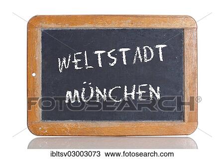 Stock Image - "Old chalkboard, lettering """"WELTSTADT MUENCHEN"""", German for """"WORLD CITY OF MUNICH""""". Fotosearch