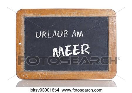 "Old chalkboard, lettering """"URLAUB AM MEER"""", German for """"A HOLIDAY AT THE SEASIDE""""" View Large Photo Image Picture - "Old chalkboard, lettering """"URLAUB AM MEER"""", German for """"A HOLIDAY AT THE SEASIDE""""". Fotosearch