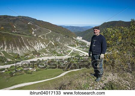"Old Chechen man at an overlook in the Chechen mountains, Chechnya, Caucasus, Russia, Europe" View Large Photo Image Stock Image - "Old Chechen man at an overlook in the Chechen mountains, Chechnya, Caucasus, Russia, Europe". Fotosearch
