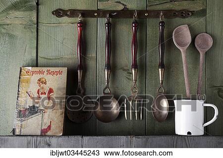 "Old cookbook and cooking utensils in front of a green wooden wall, Germany, Europe" View Large Photo Image Stock Image - "Old cookbook and cooking utensils in front of a green wooden wall, Germany, Europe". Fotosearch