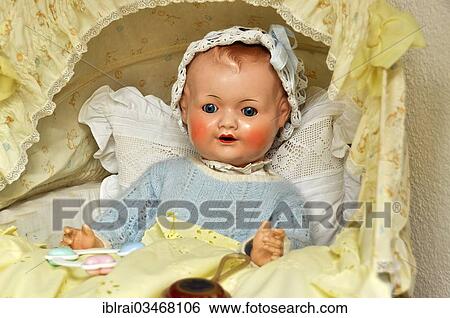 Stock Photograph - "Old doll from the Schildkroet factory in the shop Buedinger Puppenhaus, Budingen, Hesse, Germany, Europe". Fotosearch