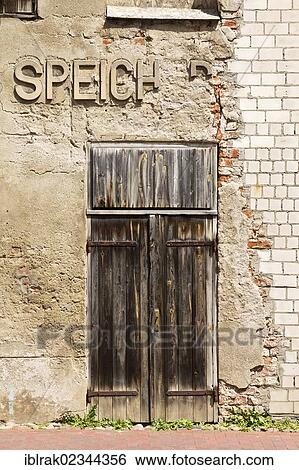 "Old door to a warehouse in the historic district, Wismar, Mecklenburg-Western Pomerania, Germany, Europe" View Large Photo Image Stock Photograph - "Old door to a warehouse in the historic district, Wismar, Mecklenburg-Western Pomerania, Germany, Europe". Fotosearch