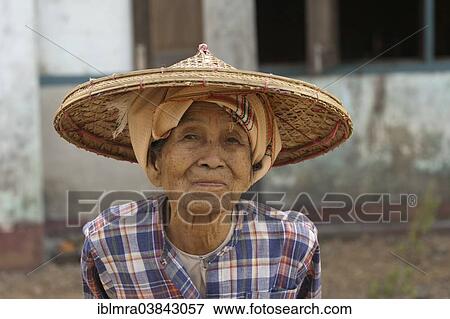 "Old female farmer wearing a hat, Yangon, Myanmar, Asia" View Large Photo Image Stock Photo - "Old female farmer wearing a hat, Yangon, Myanmar, Asia". Fotosearch