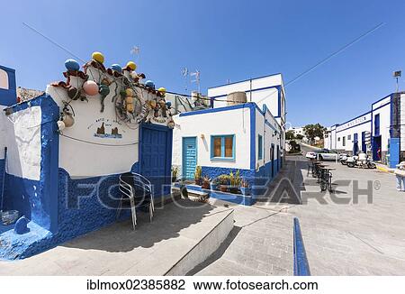 "Old fenders decorating a house in the fishing village of Puerto de las Nieves, El Palmeral, Agaete Region, Gran Canaria, Canary Islands, Spain, Europe, PublicGround, Europe" View Large Photo Image Stock Image - "Old fenders decorating a house in the fishing village of Puerto de las Nieves, El Palmeral, Agaete Region, Gran Canaria, Canary Islands, Spain, Europe, PublicGround, Europe". Fotosearch