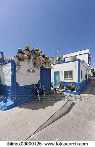 "Old fenders on a house as decoration, fishing village of Puerto De Las Nieves, Agaete, Gran Canaria, Kanarische Inseln, Puerto De Las Nieves, El Palmeral, Spain, Europe" View Large Photo Image Stock Photograph - "Old fenders on a house as decoration, fishing village of Puerto De Las Nieves, Agaete, Gran Canaria, Kanarische Inseln, Puerto De Las Nieves, El Palmeral, Spain, Europe". Fotosearch