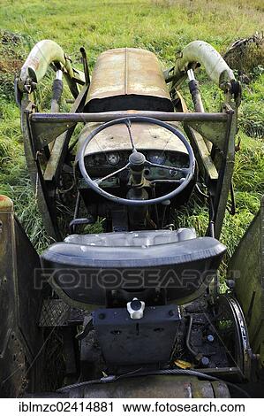Stock Image - Old Fendt tractor from 1969 on a meadow, Gut Othenstorf, Zum Weissen Haus, Mecklenburg-Western Pomerania, Germany, Europe. Fotosearch