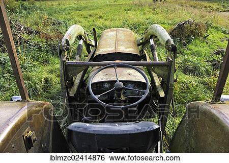 Stock Photograph - Old Fendt tractor from 1969 on a meadow, Gut Othenstorf, Zum Weissen Haus, Mecklenburg-Western Pomerania, Germany, Europe. Fotosearch
