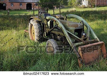 Stock Image - Old Fendt tractor from 1969, still working, Gut Othenstorf estate, Othenstorf, Mecklenburg-Western Pomerania, Germany, Europe. Fotosearch