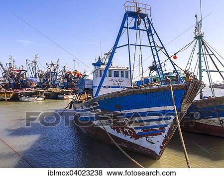 "Old fishing boats in the harbor of Essaouira, Unesco World Heritage Site, Morocco, Africa" View Large Photo Image Stock Photo - "Old fishing boats in the harbor of Essaouira, Unesco World Heritage Site, Morocco, Africa". Fotosearch