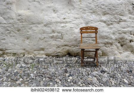 "Old folding chair in front of a wall, Rhodes, Greece, Europe" View Large Photo Image Stock Image - "Old folding chair in front of a wall, Rhodes, Greece, Europe". Fotosearch