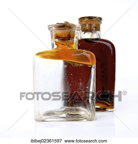 Stock Photo - Old glass bottles with corks. Fotosearch