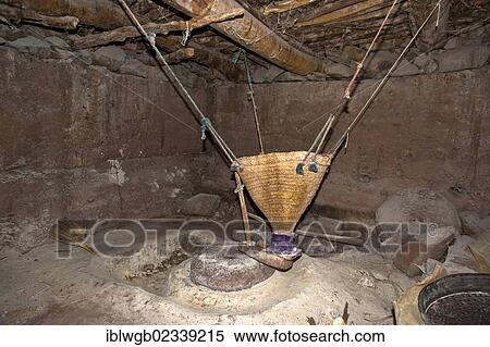"Old grain mill and a grinding stone on a stream, Ait Bouguemez, High Atlas, Morocco, Africa" View Large Photo Image Stock Photography - "Old grain mill and a grinding stone on a stream, Ait Bouguemez, High Atlas, Morocco, Africa". Fotosearch