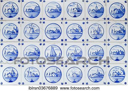 "Old hand-painted Delftware tiles in a heated women's room in the only house on Suederoog Hallig, small island, Hallig Suderoog, Schleswig-Holstein, Germany, Europe" View Large Photo Image Stock Photo - "Old hand-painted Delftware tiles in a heated women's room in the only house on Suederoog Hallig, small island, Hallig Suderoog, Schleswig-Holstein, Germany, Europe". Fotosearch