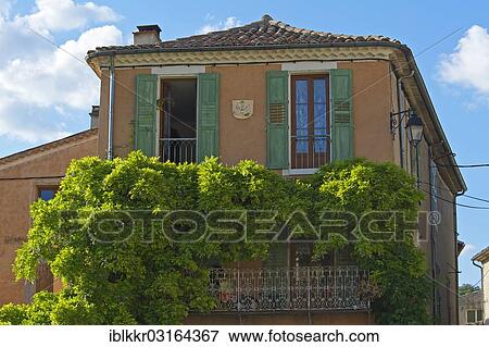 "Old house covered in wisteria or wysteria, Riez, Provence, Region Provence-Alpes-Cote d? ÇÖAzur, France, Europe" View Large Photo Image Stock Photo - "Old house covered in wisteria or wysteria, Riez, Provence, Region Provence-Alpes-Cote d? ÇÖAzur, France, Europe". Fotosearch