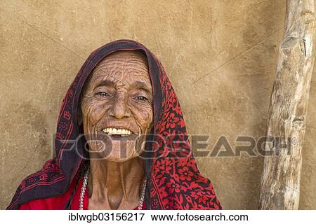 "Old Indian woman with headscarf, portrait, Wuste Thar, Rajasthan, India, Asia" View Large Photo Image Stock Photo - "Old Indian woman with headscarf, portrait, Wuste Thar, Rajasthan, India, Asia". Fotosearch