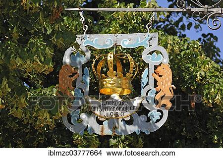 "Old inn sign, signboard of """"Goldene Krone"""", German for """"Golden Crown"""", originally from Oberampfrach, relocated to the Franconian Open Air Museum in Bad Windsheim, Middle Franconia, Bavaria, Germany, Europe" View Large Photo Image Picture - "Old inn sign, signboard of """"Goldene Krone"""", German for """"Golden Crown"""", originally from Oberampfrach, relocated to the Franconian Open Air Museum in Bad Windsheim, Middle Franconia, Bavaria, Germany, Europe". Fotosearch