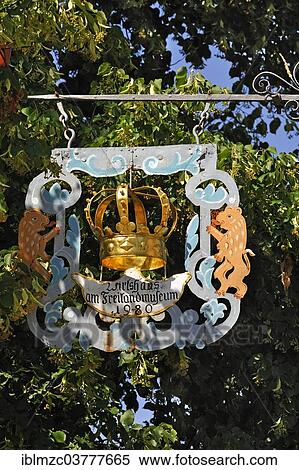 "Old inn sign, signboard of """"Goldene Krone"""", German for """"Golden Crown"""", originally from Oberampfrach, relocated to the Franconian Open Air Museum in Bad Windsheim, Middle Franconia, Bavaria, Germany, Europe" View Large Photo Image Stock Photography - "Old inn sign, signboard of """"Goldene Krone"""", German for """"Golden Crown"""", originally from Oberampfrach, relocated to the Franconian Open Air Museum in Bad Windsheim, Middle Franconia, Bavaria, Germany, Europe". Fotosearch