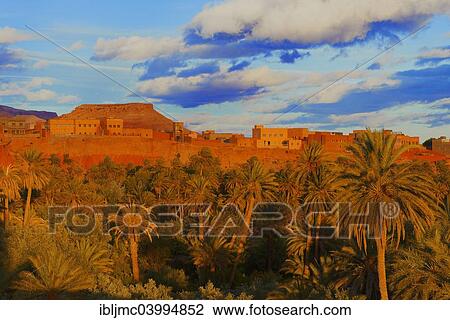 Stock Image - "Old Kasbah, oasis, evening light, Tinerhir, Tineghir, Tinghi, Todra valley, Todra Gorges, Morocco, Africa". Fotosearch