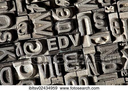 Stock Photo - "Old lead letters forming the acronym EDV, German for electronic data processing, EDP". Fotosearch