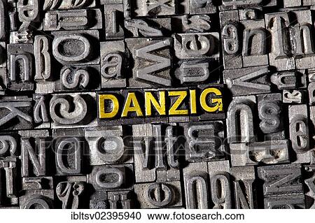 Stock Image - Old lead letters forming the name of the city of Danzig. Fotosearch