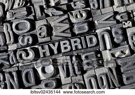 Picture - Old lead letters forming the word HYBRID. Fotosearch