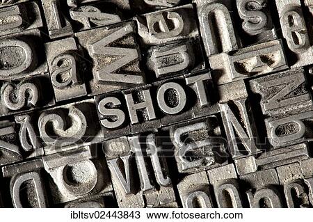 Stock Image - Old lead letters forming the word SHOT. Fotosearch