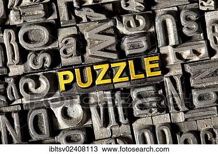 Stock Image - "Old lead letters forming the word """"PUZZLE""""". Fotosearch