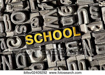 Stock Image - "Old lead letters forming the word """"SCHOOL""""". Fotosearch