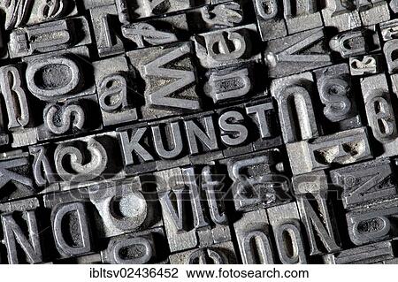 Stock Image - "Old lead letters forming the word """"KUNST"""", German for """"ART""""". Fotosearch