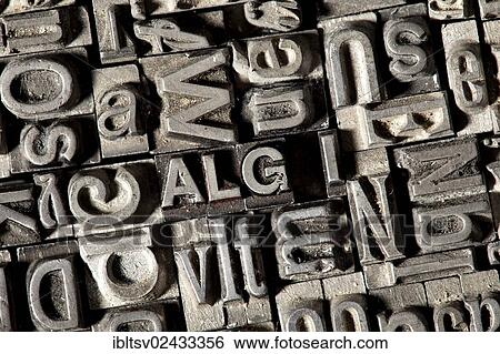 Stock Photograph - "Old lead letters forming the word """"ALG I"""", German for """"unemployment benefit""""". Fotosearch