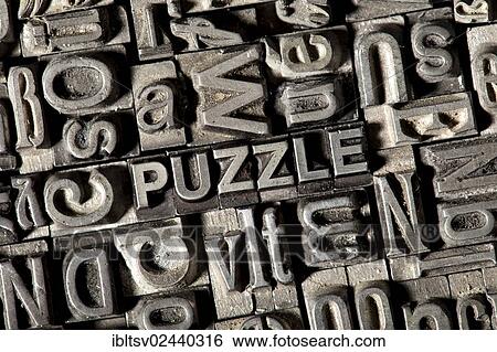 "Old lead letters forming the word """"PUZZLE""""" View Large Photo Image Stock Photograph - "Old lead letters forming the word """"PUZZLE""""". Fotosearch