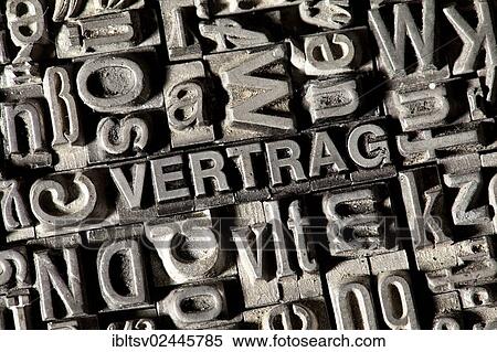 Stock Photography - "Old lead letters forming the word VERTRAG, German for contract". Fotosearch