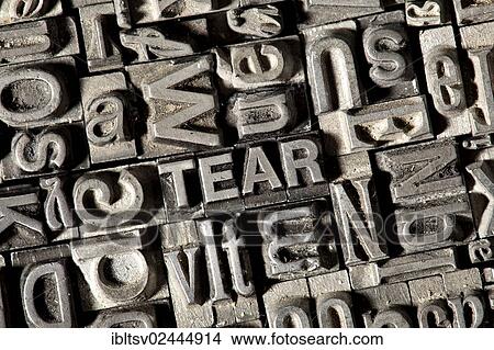 Old lead letters forming the word TEAR View Large Photo Image Picture - Old lead letters forming the word TEAR. Fotosearch