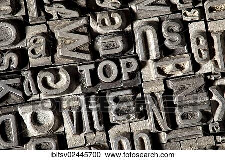 Stock Image - Old lead letters forming the word TOP. Fotosearch