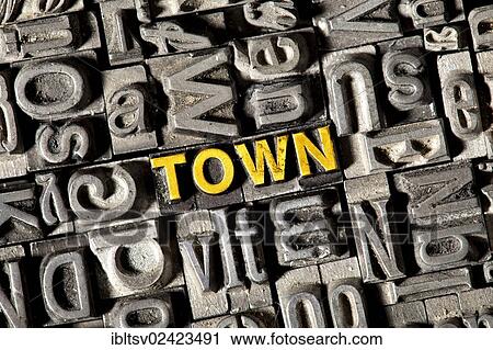 Stock Image - Old lead letters forming the word Town. Fotosearch